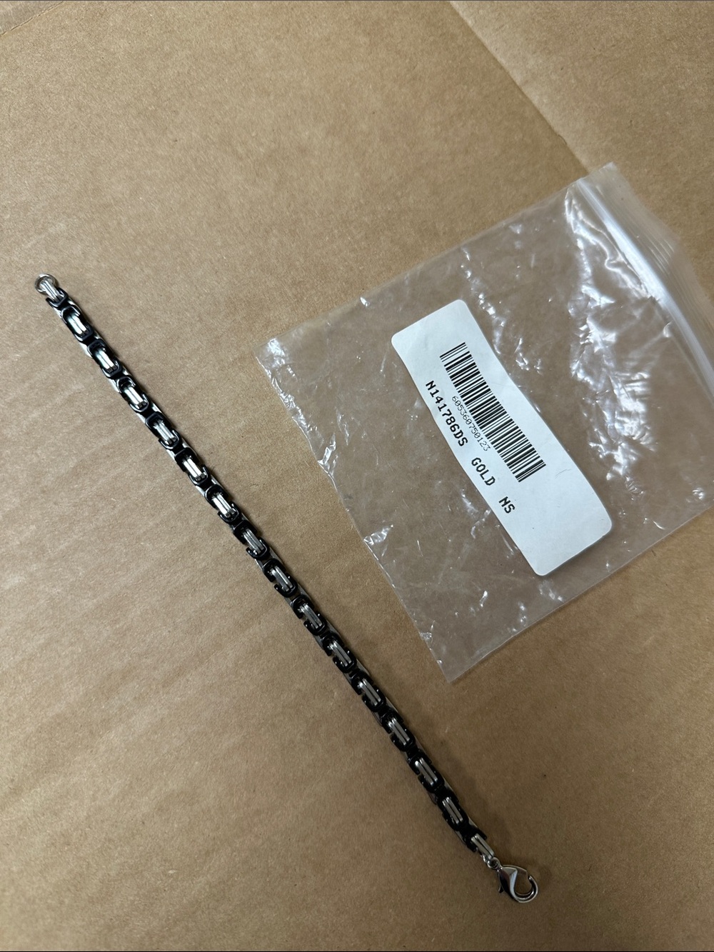 ##122, Guess/Marciano Two-Tone Black and Silver Chain Bracelet